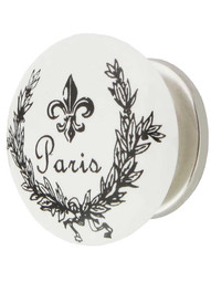 White Porcelain Paris Fleur-De-Lis Cabinet Knob with Brass Base in Polished Nickel.